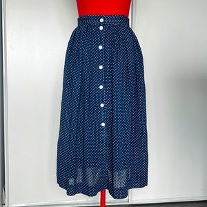 Polka dot navy blue midi skirt with side pockets